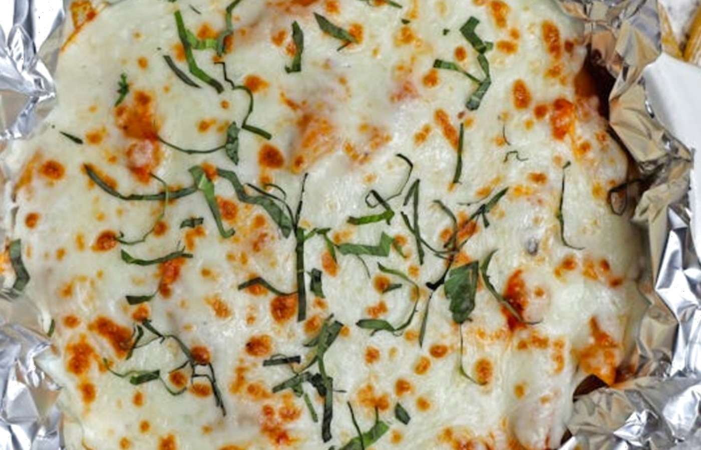 Pasta al forno bianca con zucchine e prosciutto