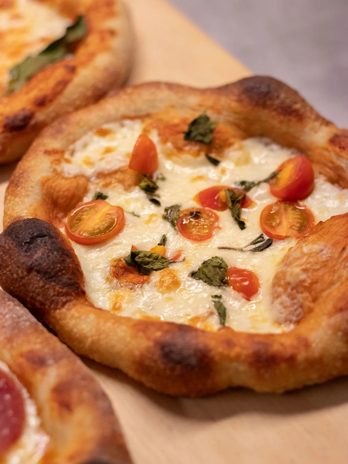 Margherita pizza on a rustic table